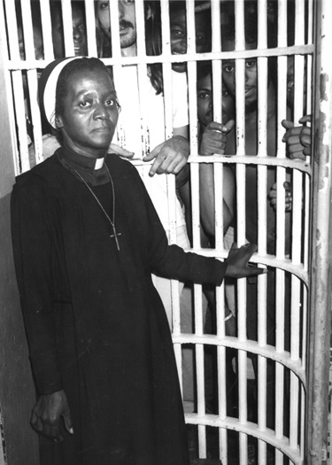 York in front of bars